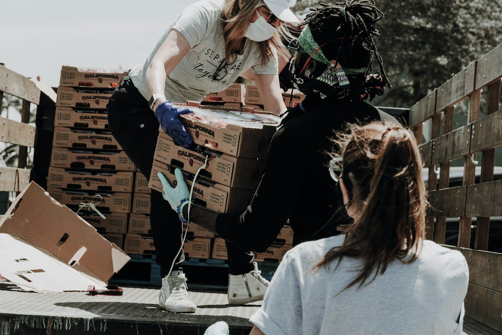 Volunteers packing donation boxes